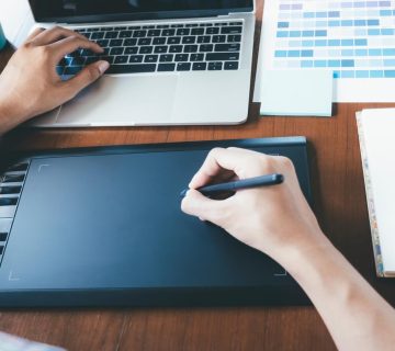 Designer sketching a logo 360x320